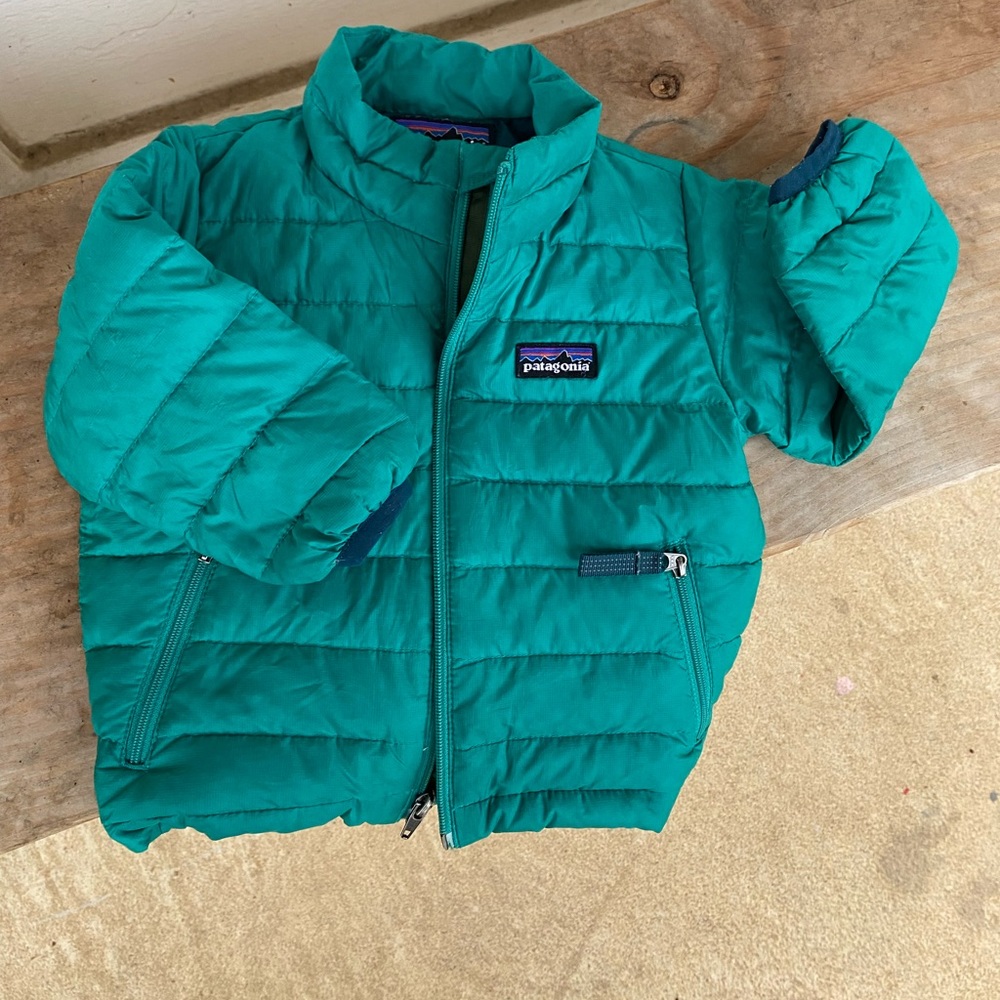 Patagonia coat fits well from 6 months - about 18 months